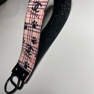 Paw print Chanel keychain wristlet